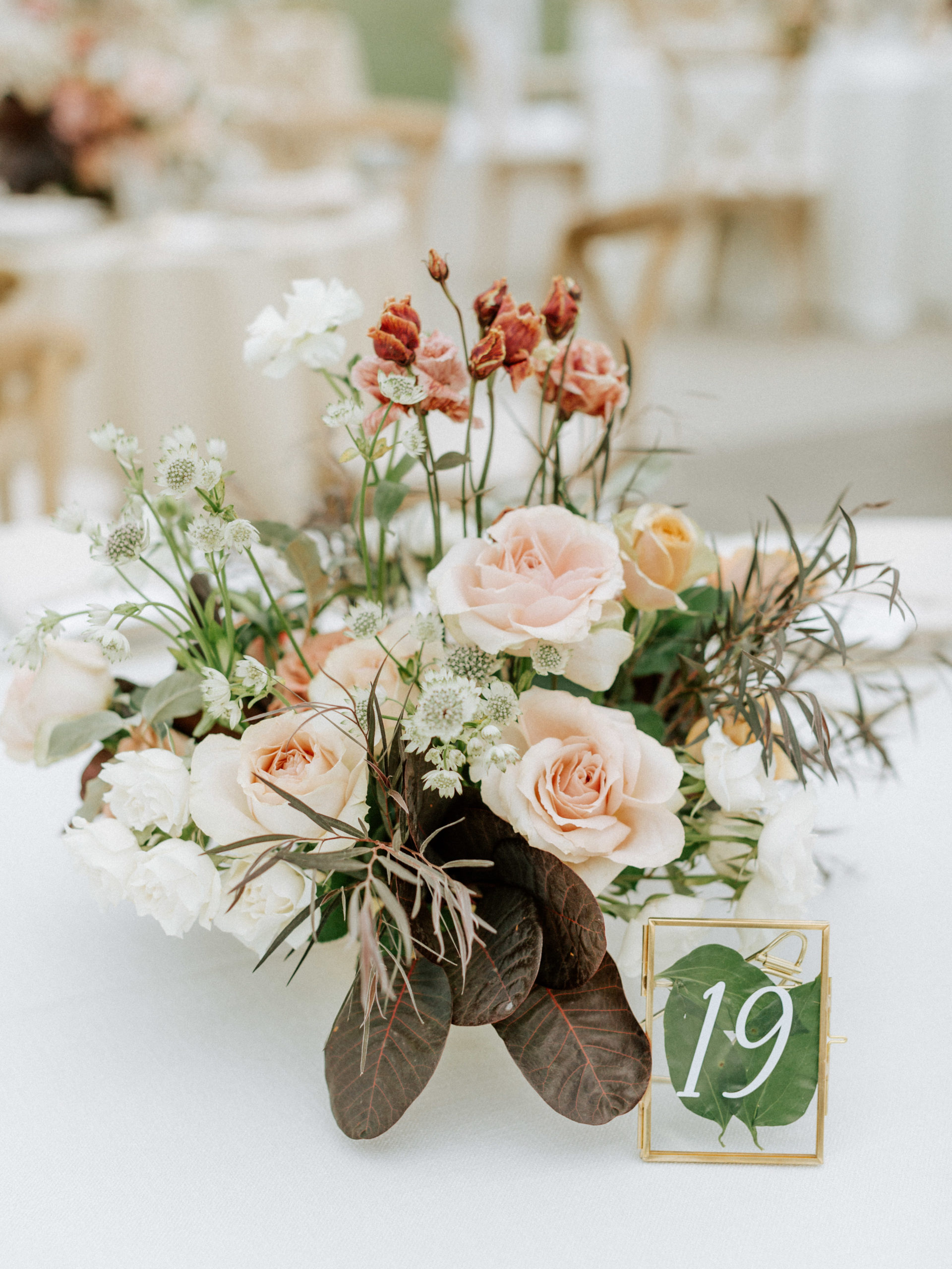 Table numbers with greenery