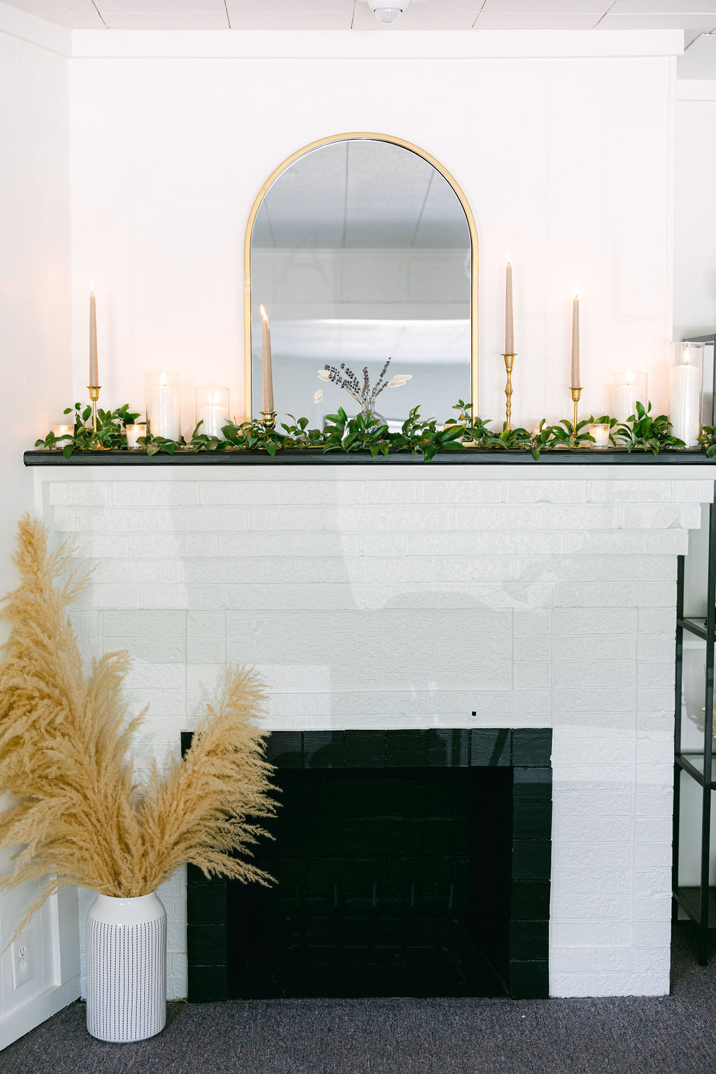 Fireplace greenery and candles